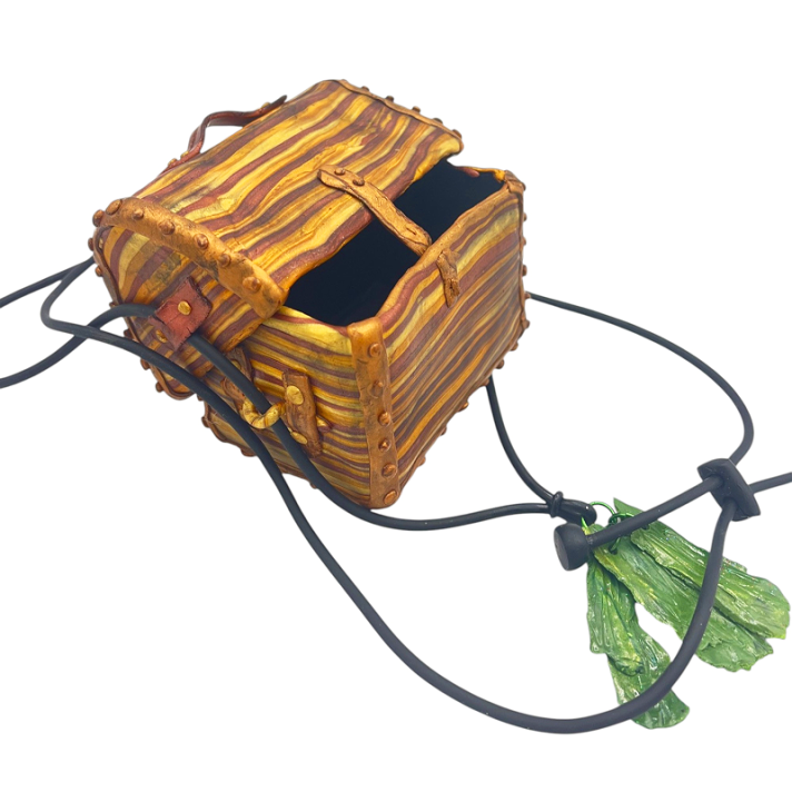 The inspiration piece gave me so many options that for a long time, I couldn’t decide which direction to take my work. When I did make a choice, it was to limit myself to one aspect of the whole, amplify it, and then choose a single embellishment from the other possibilities to finish it off.