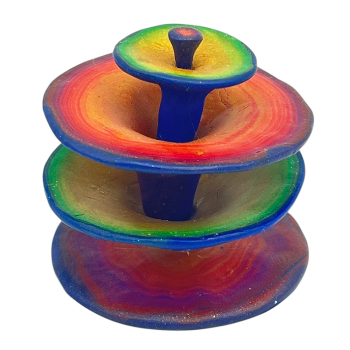 I saw layers of Skinner Blend spirals on top of each other.