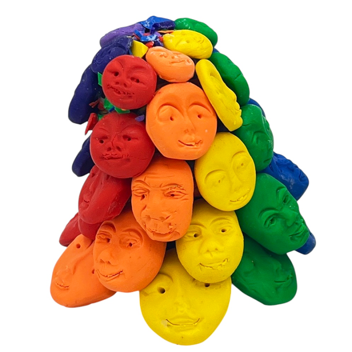 I like faces and color and thought about how heads have ears and telephones need ears which are attached to faces. I loved the shape of the piece I was following and the hints of color