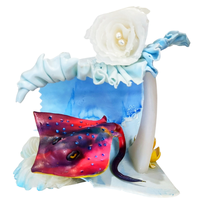 I interpreted the piece previous to mine as a dinosaur guarding a yellow egg. The egg became the focus of the piece for me. Can you guess where the stingray came from?