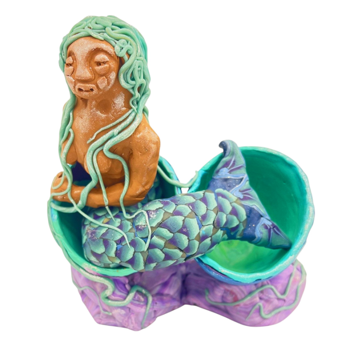 I was inspired by the eggshell in Sam's piece that the stingray appeared to hatch out of. I started thinking about what other undersea creatures hatch from eggs- and thought of fish, and then mermaids...and thought, mermaids being half fish, they quite possibly hatch from eggs! -in fact, I'm pretty sure I saw that one time-and that's what I went with.